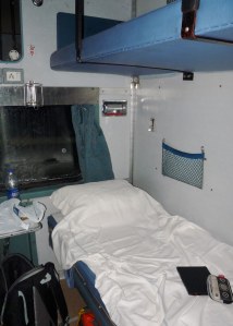 A compartment of my own.  My bed has been set up for my overnight journey to Delhi.